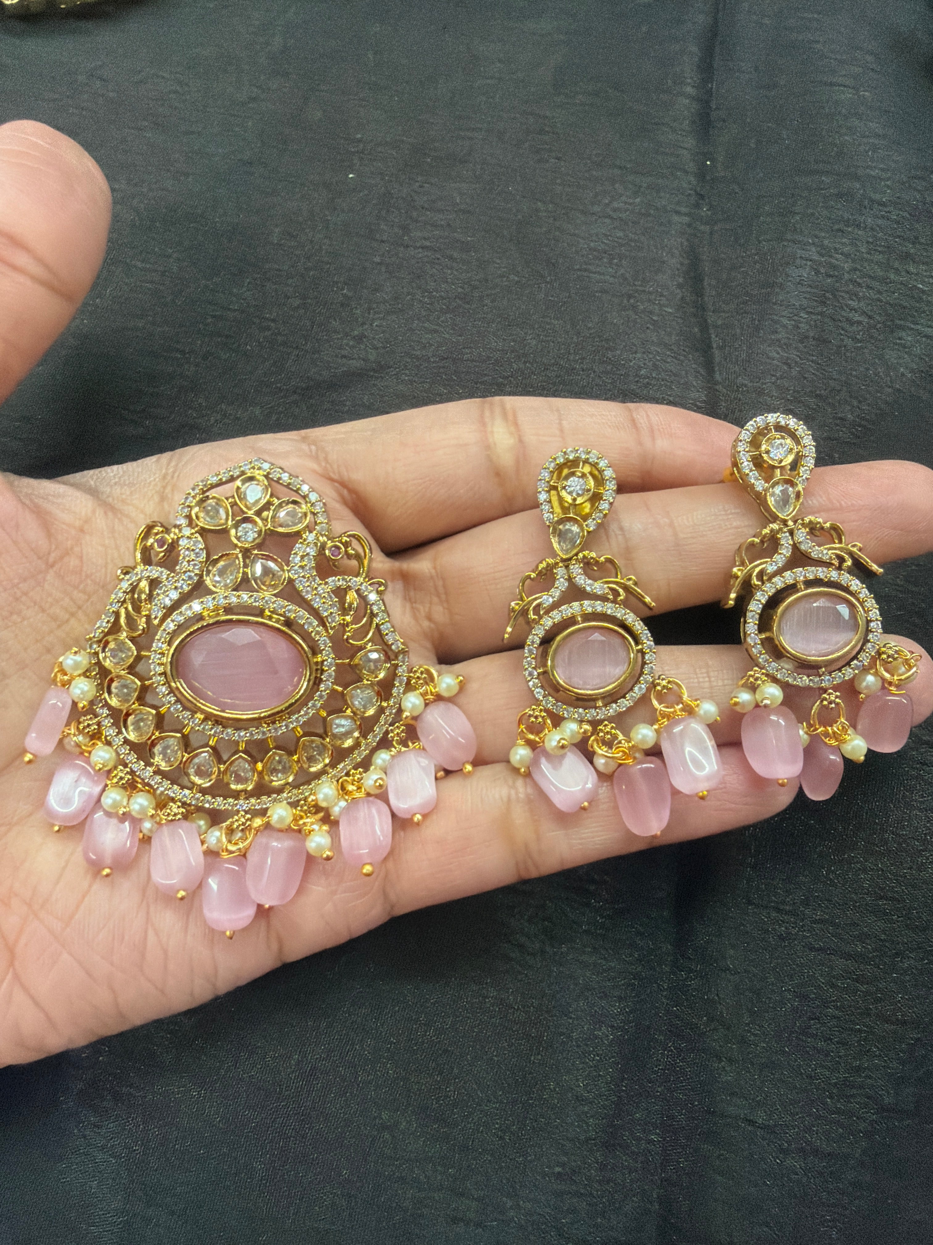 Elegant pendant set paired with earrings