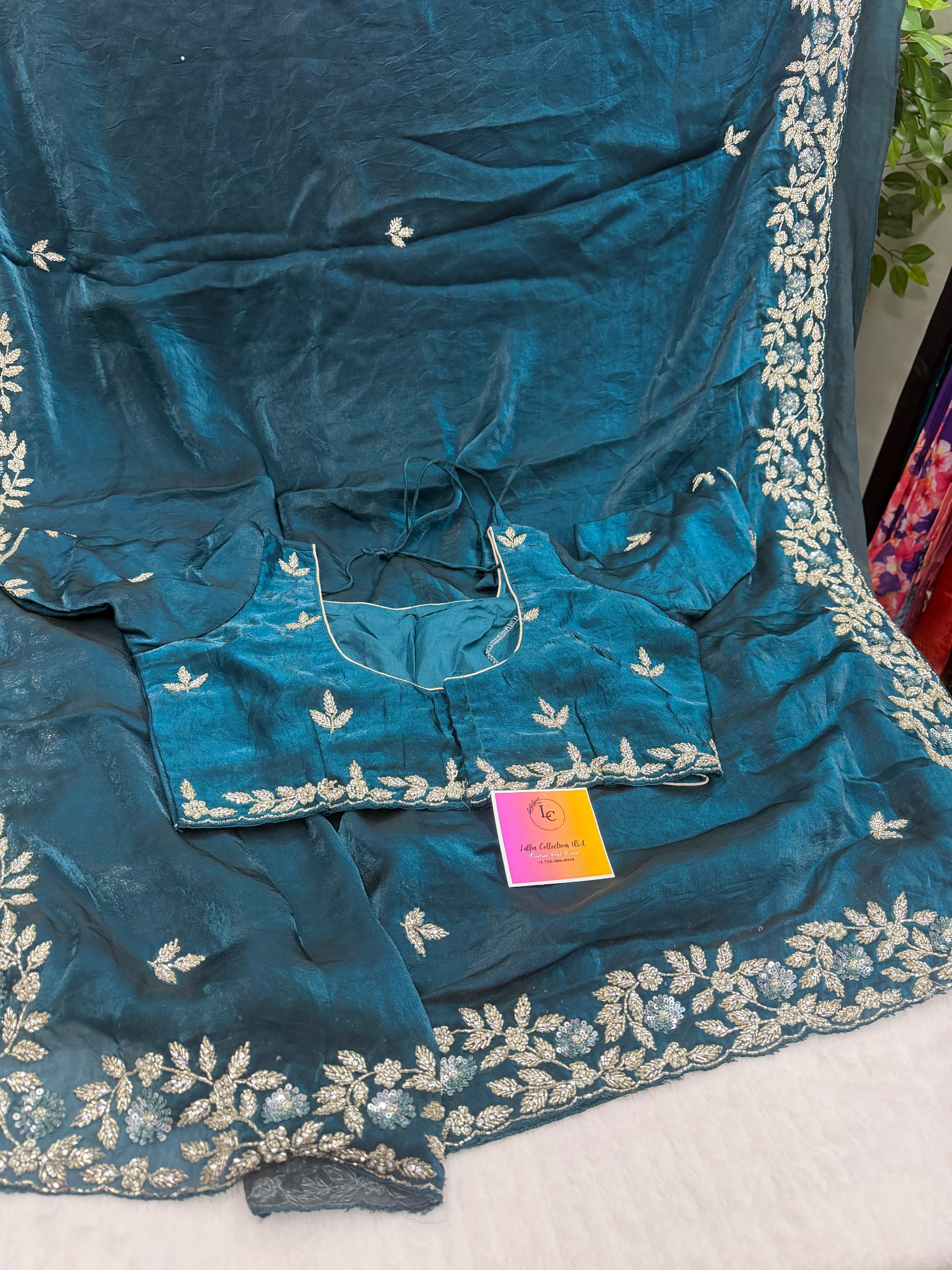 Premium party wear saree with stiched blouse