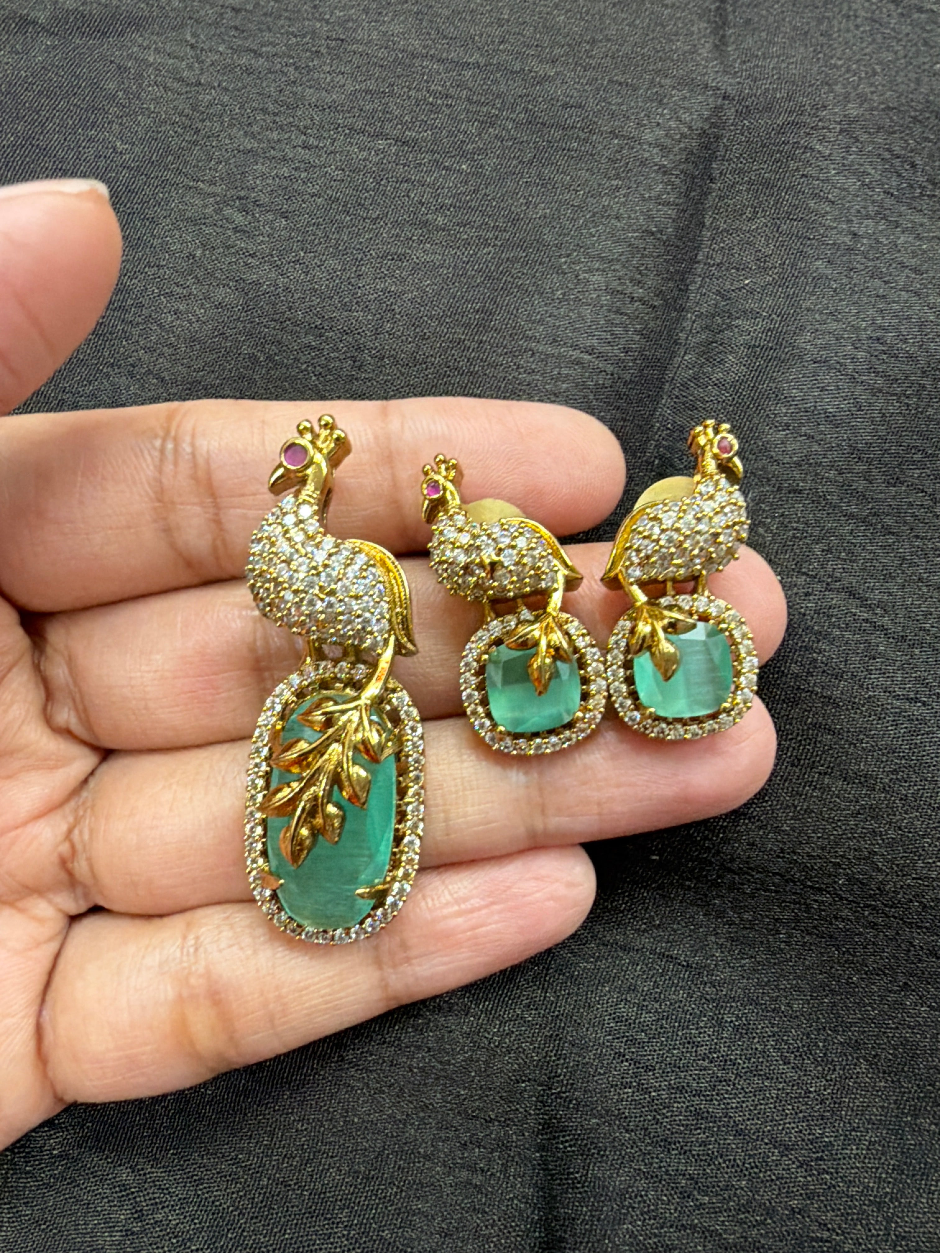 Elegant pendant set paired with earrings