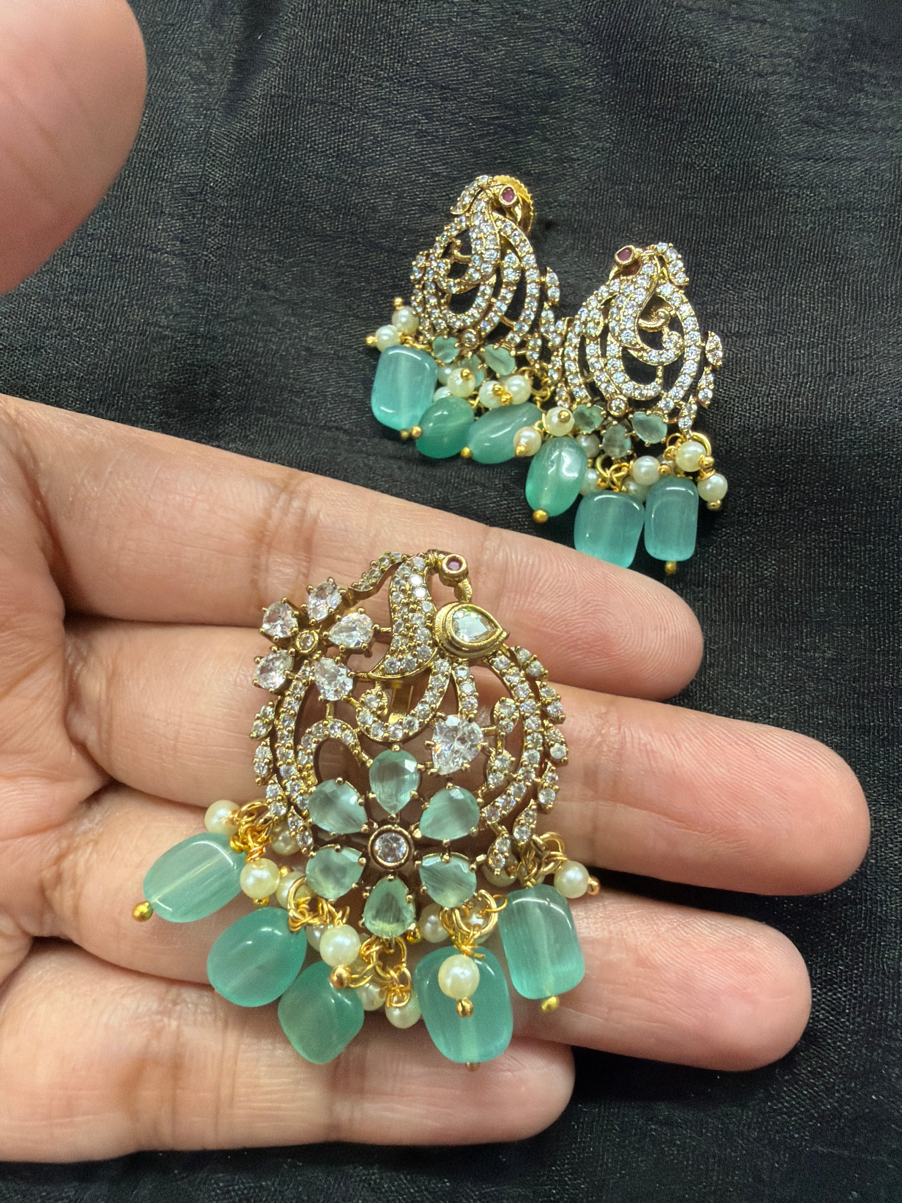 Elegant pendant set paired with earrings
