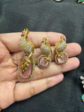 Elegant pendant set paired with earrings