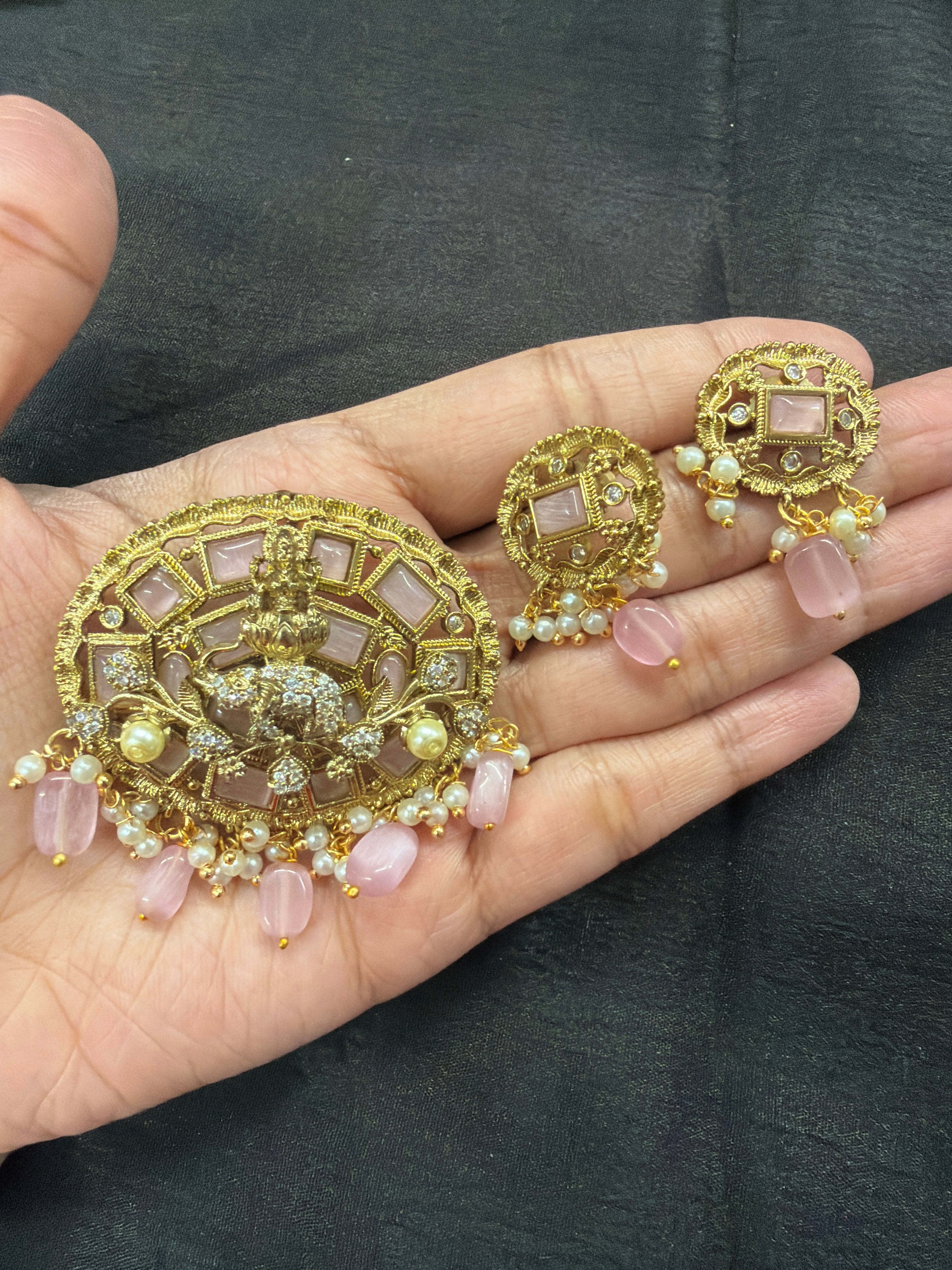 Elegant pendant set paired with earrings
